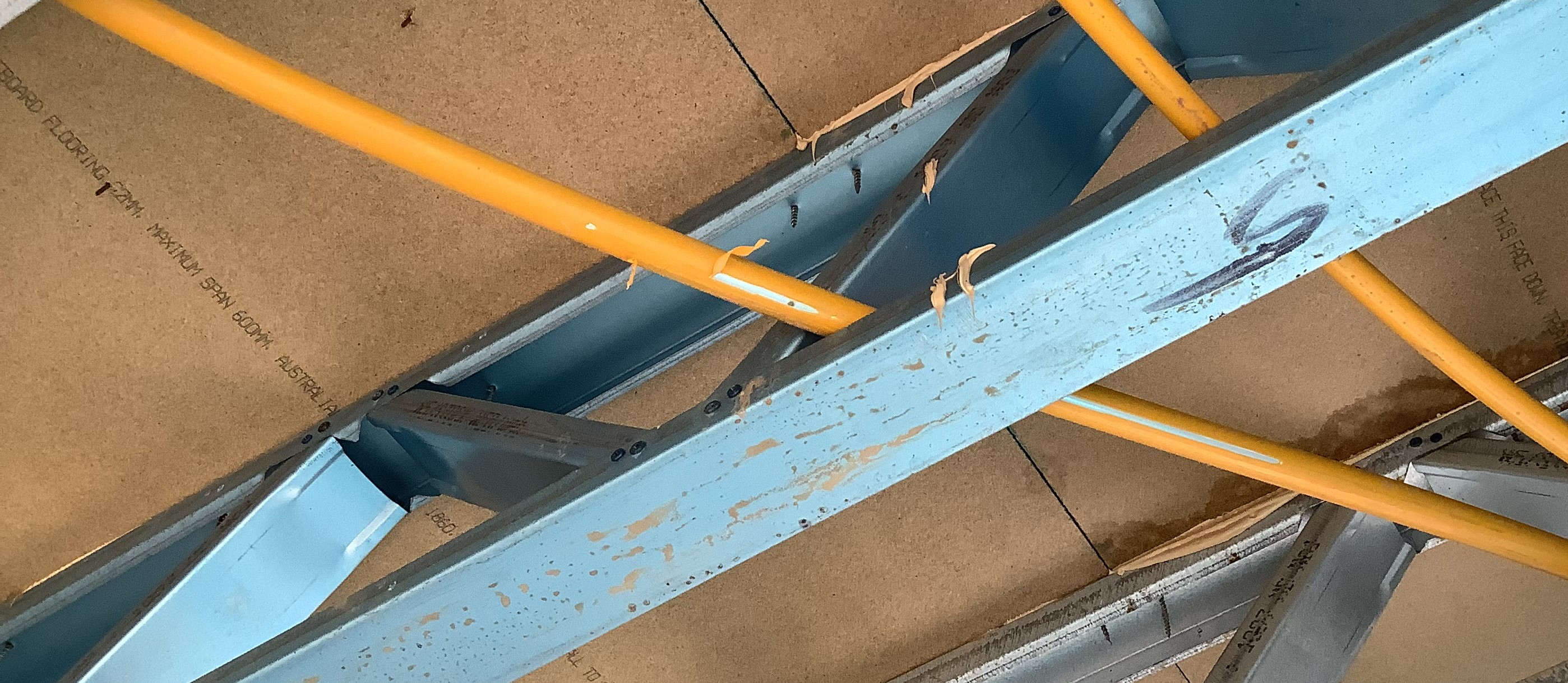 Image example 3: The gas multilayer pipe has been damaged during installation. Insufficient care taken when dragging the pipe past the metal joists.
