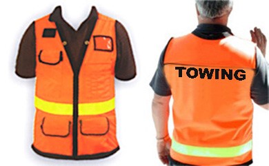 Towing' printed on vest